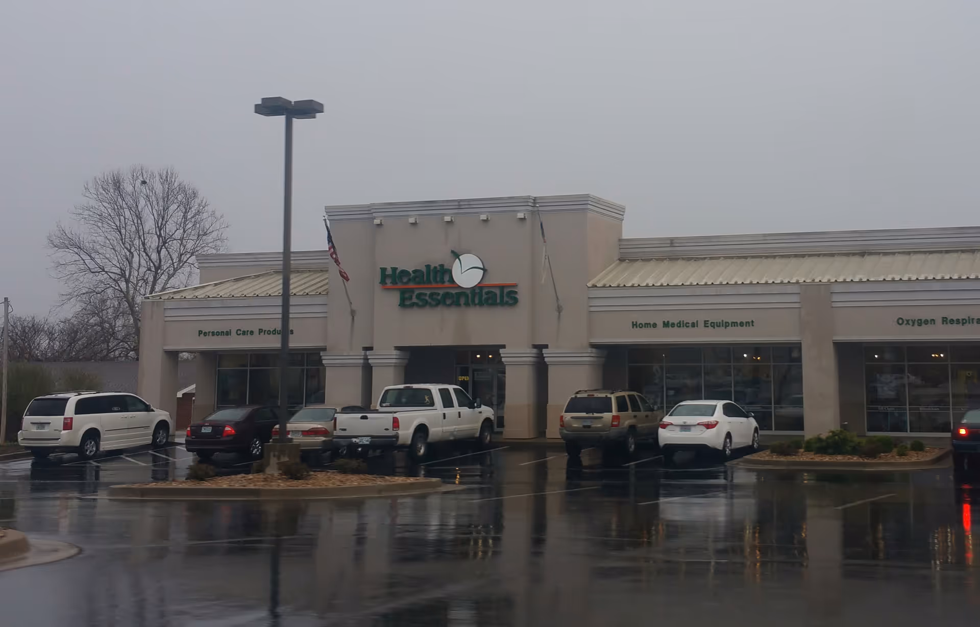 Front of Freeman Health Essentials- Joplin with parked cars in the lot.