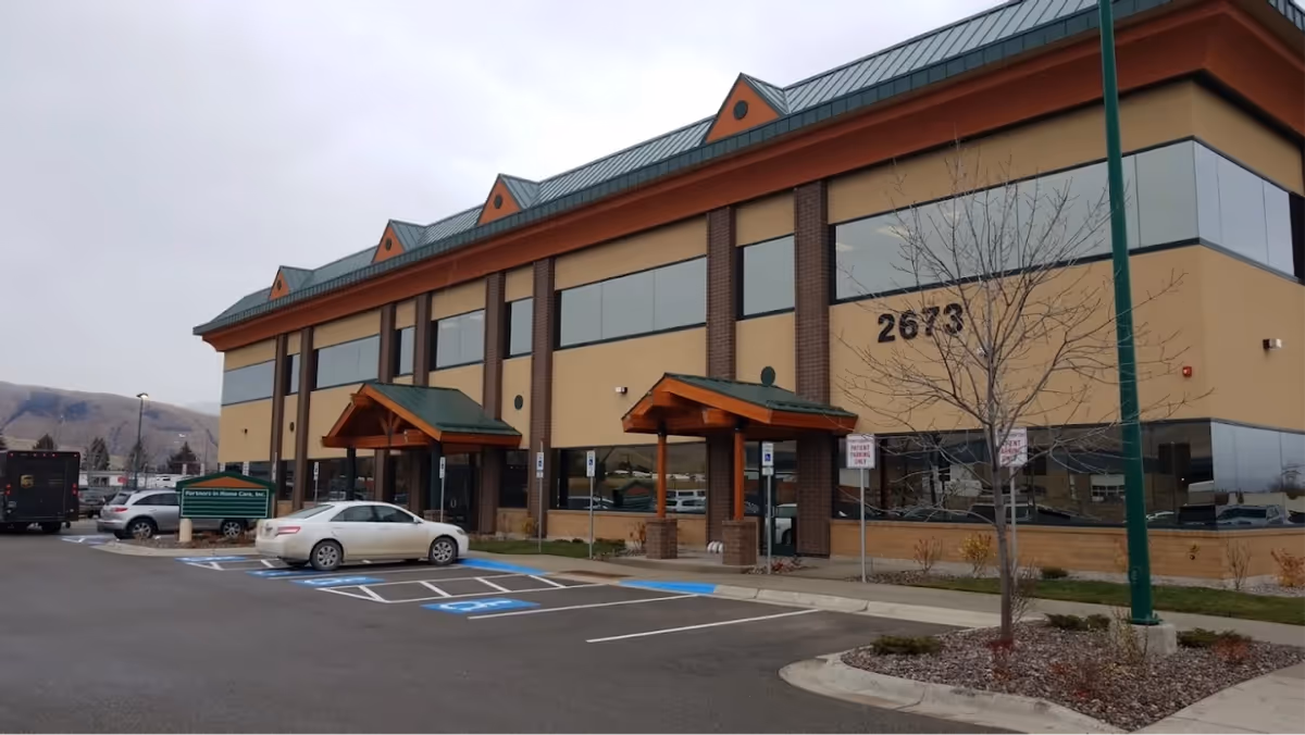Exterior view of Partners Home Medical Equipment building with a covered entrance.