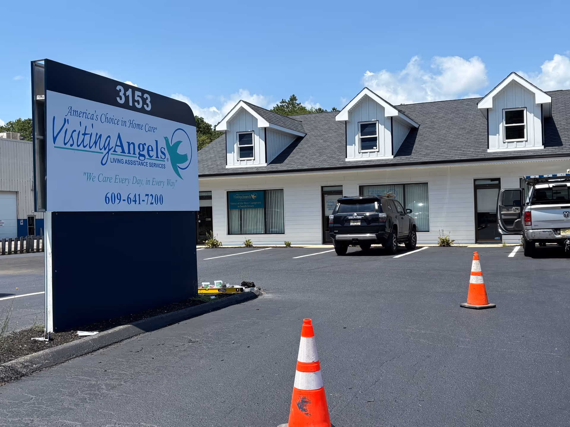 Exterior view of Visiting Angels Senior Home Care building with a large sign
