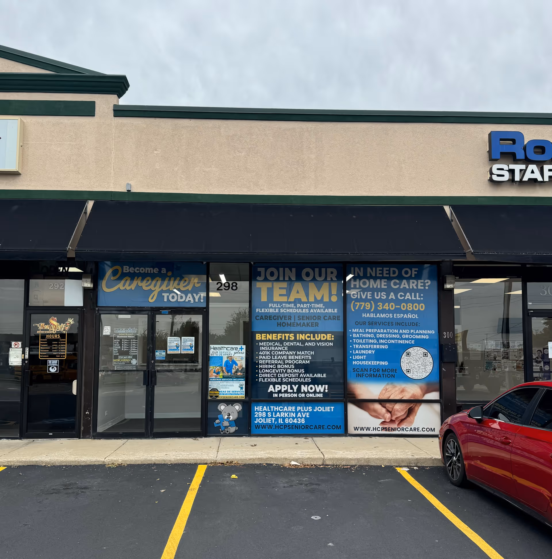 Exterior storefront with blue banners advertising caregiver jobs and senior care services.