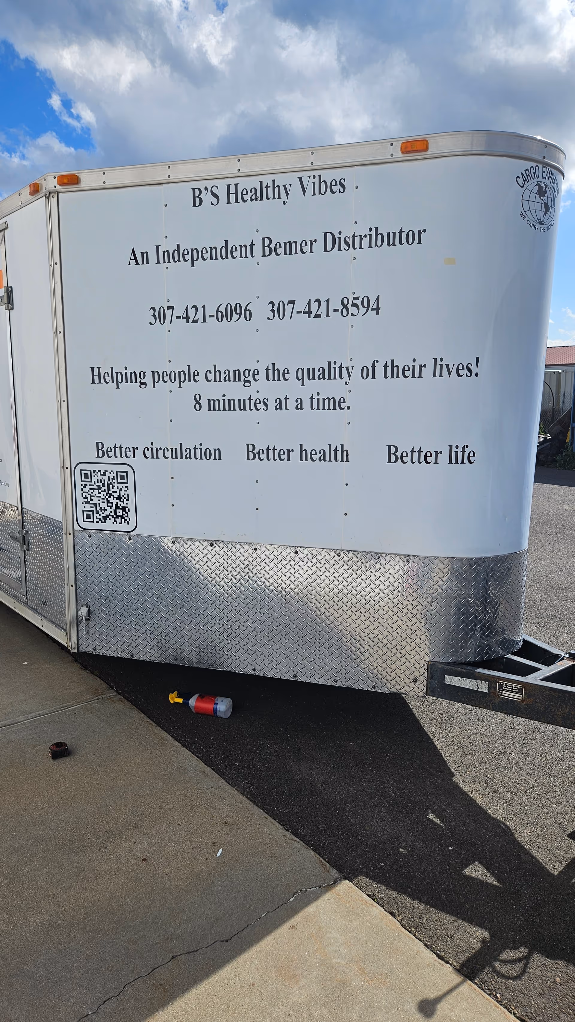 White promotional trailer for B'S Healthy Vibes with contact numbers.
