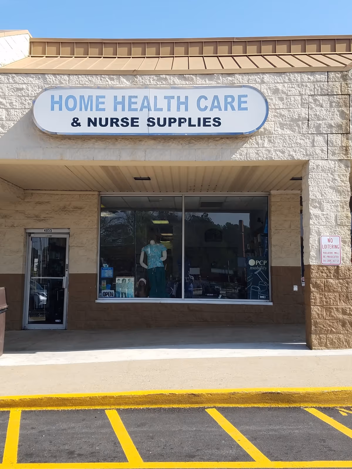 Exterior storefront with a large sign reading Home Health Care & Nurse Supplies.