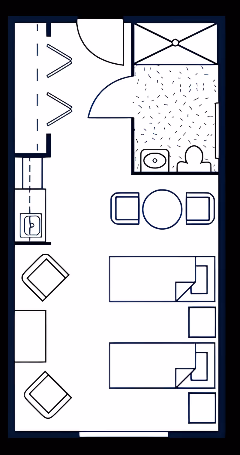 Top-down floor plan of a two-bed room with a bathroom, kitchenette, seating area, and closet.