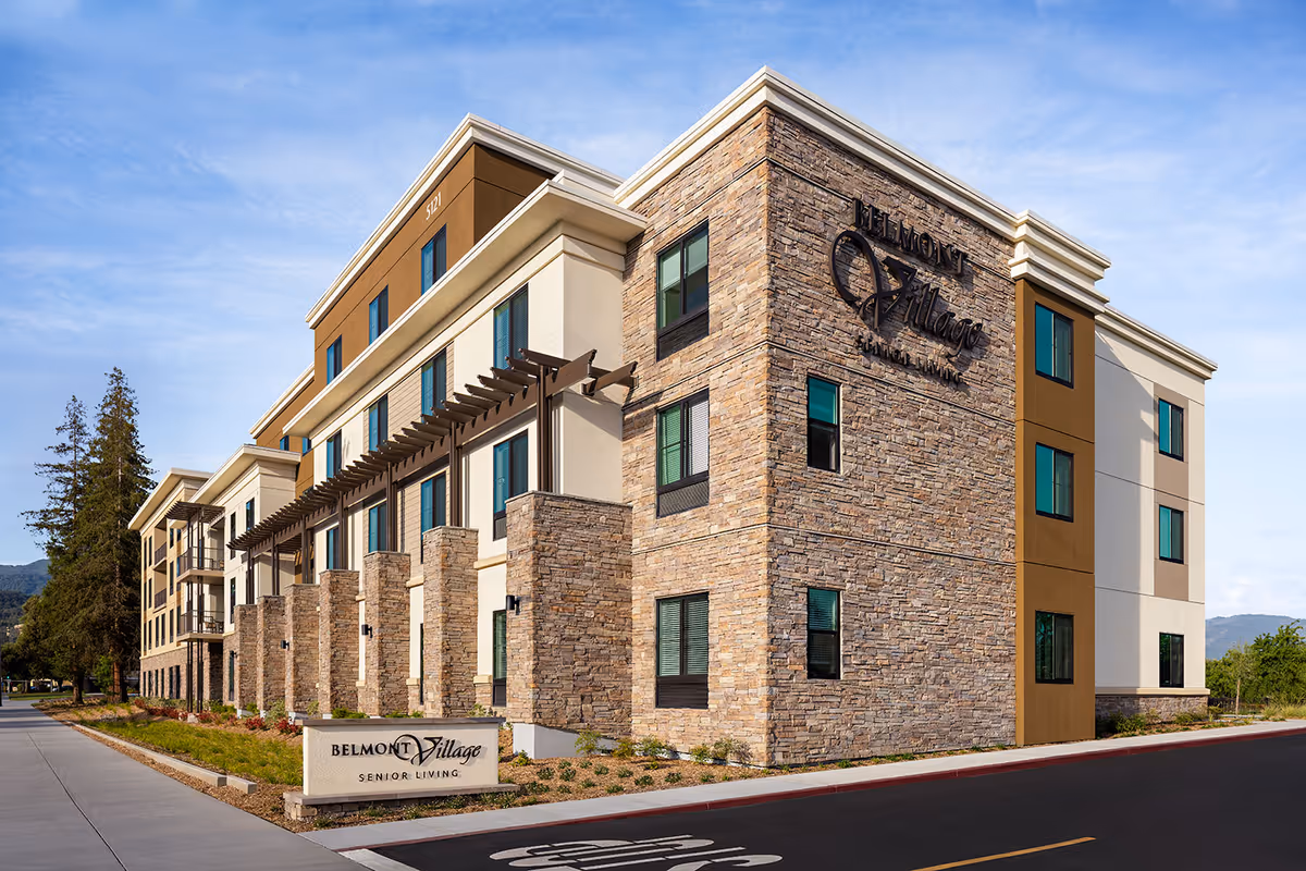 Exterior view of Belmont Village Senior Living Los Gatos, a modern multi-story building.