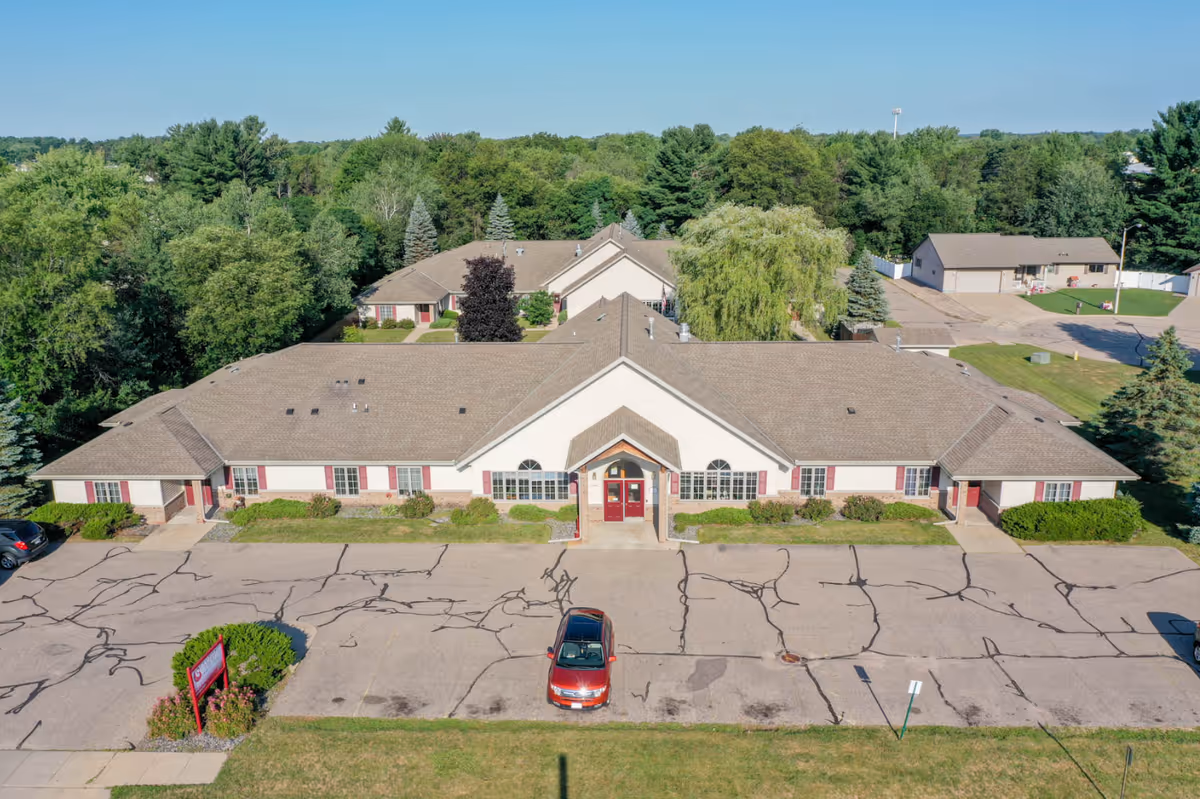 Aerial view of Cranberry Court Assisted Living building with front entrance and parking