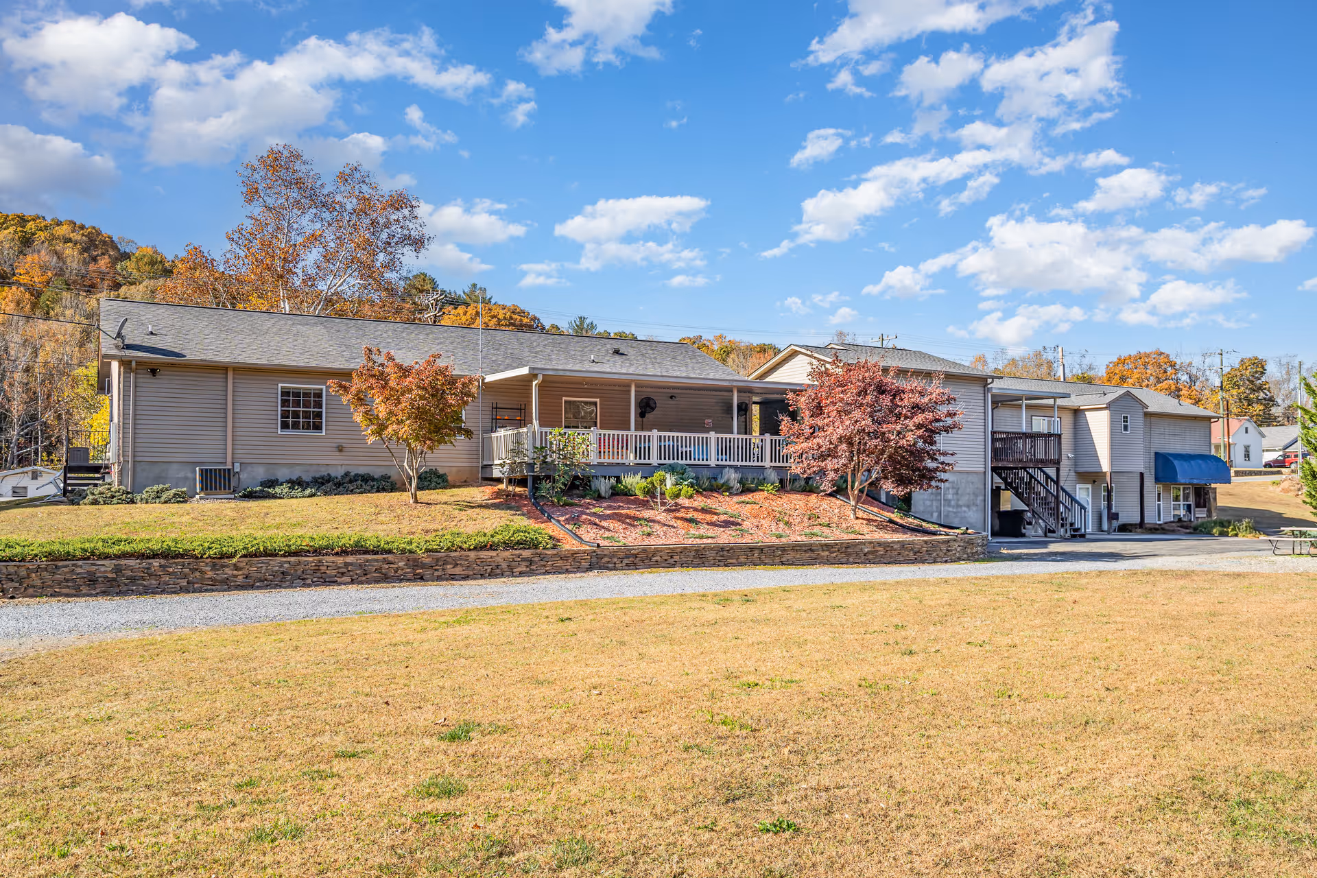 Exterior view of Serenity Family Care 2, a single-story facility with front landscaping.