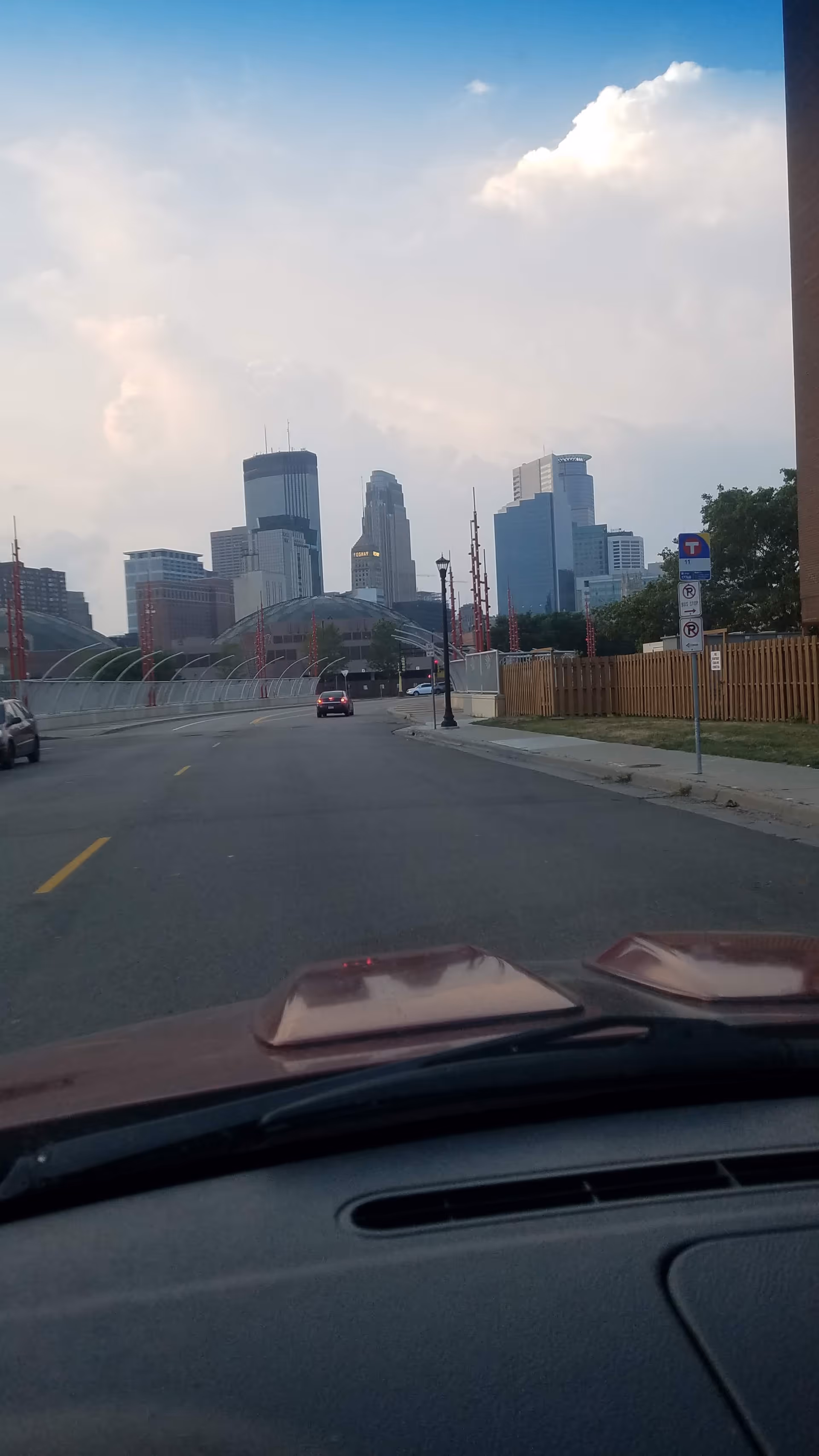 Road leading to downtown skyline viewed from car near Parker Skyview