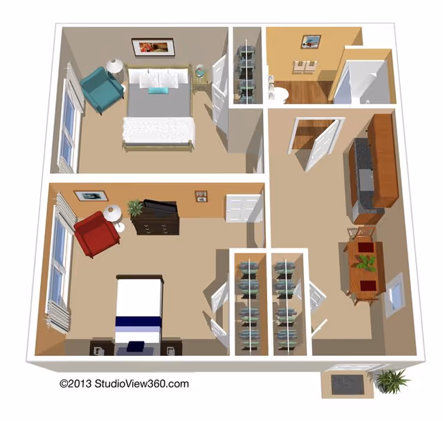 3D floor plan of a senior living facility unit showing two bedrooms, a bathroom, a kitchen with dining area, and closets. The top bedroom has a bed, a blue armchair, a nightstand with a lamp, and a framed picture on the wall. The bottom bedroom has a bed, a red armchair, a dresser with a TV, a nightstand with a lamp, and a framed picture on the wall. The bathroom includes a toilet and a shower. The kitchen has cabinets, a countertop, and a dining table with two chairs. There are two closets in the hallway between the bedrooms and kitchen.