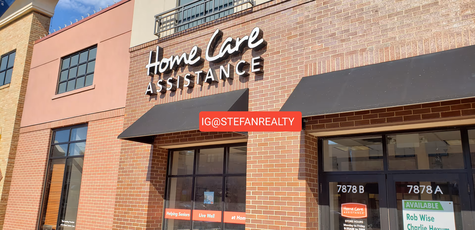 Exterior view of a brick building with a Home Care Assistance storefront sign.