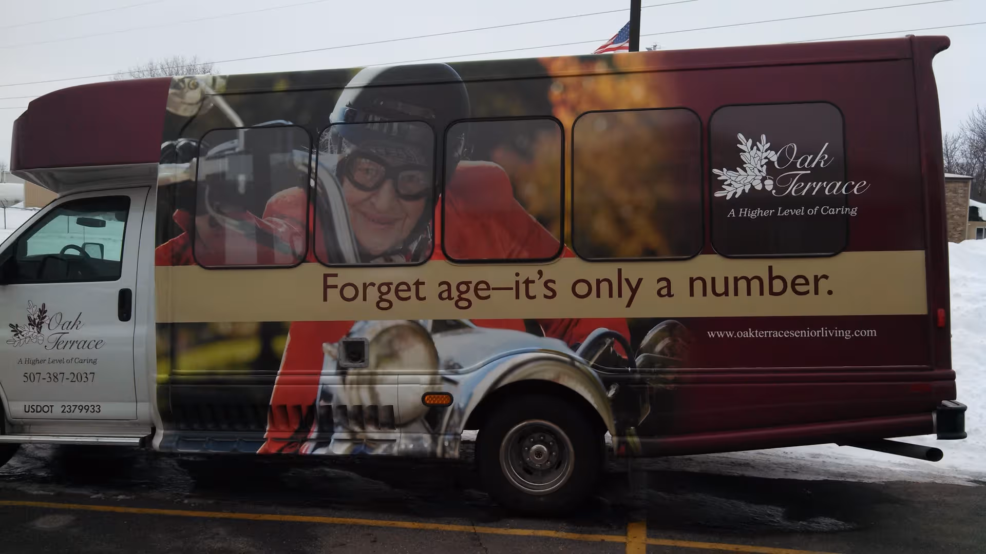 Oak Terrace senior living bus advertising slogan Forget age—it's only a number.