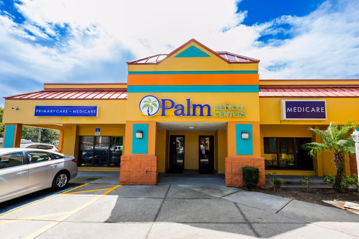 Colorful Palm Medical Centers storefront exterior with Primary Care and Medicare signage.