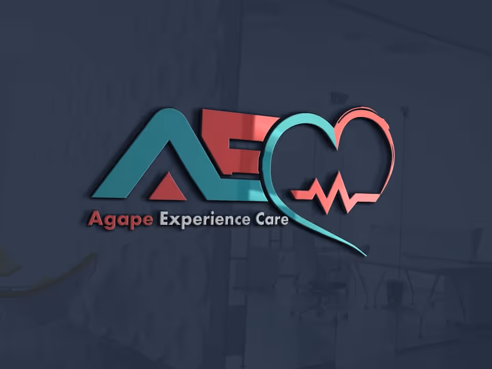 Colorful Agape Experience Care logo on a dark interior glass wall.