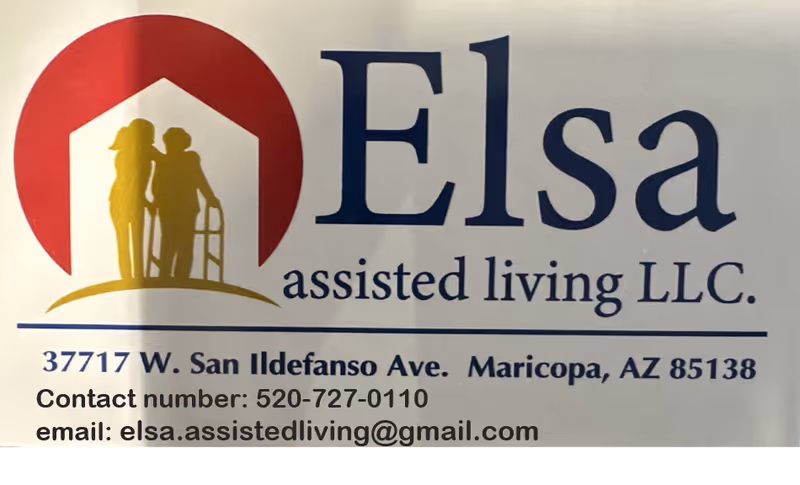 Sign reads Elsa assisted living LLC with logo and contact information on a wall.