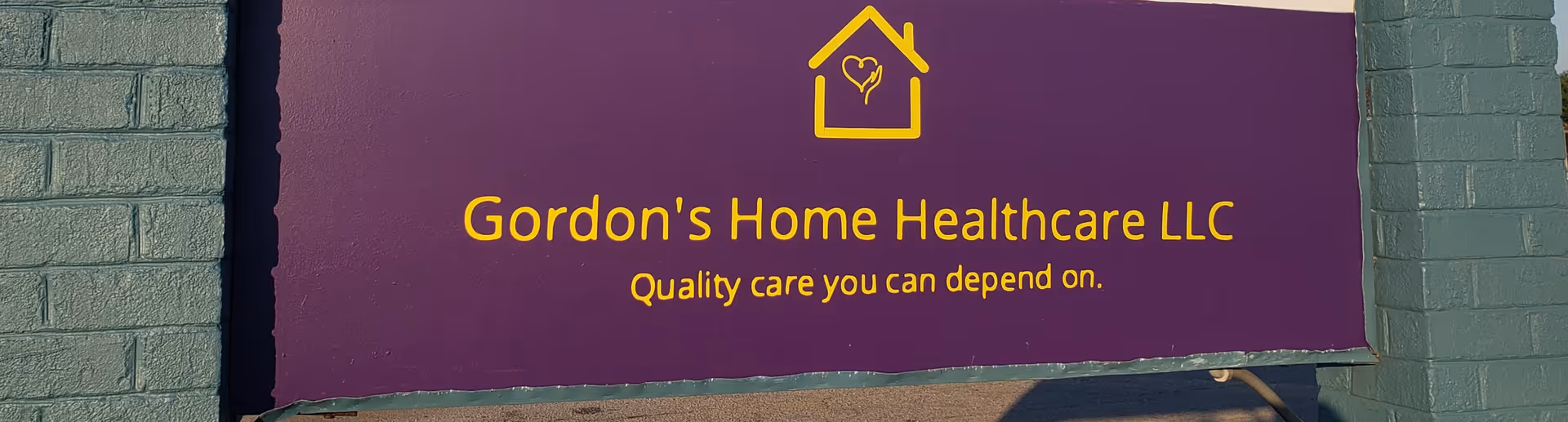 Purple exterior sign reading Gordon's Home Healthcare LLC with tagline Quality care you can depend on.