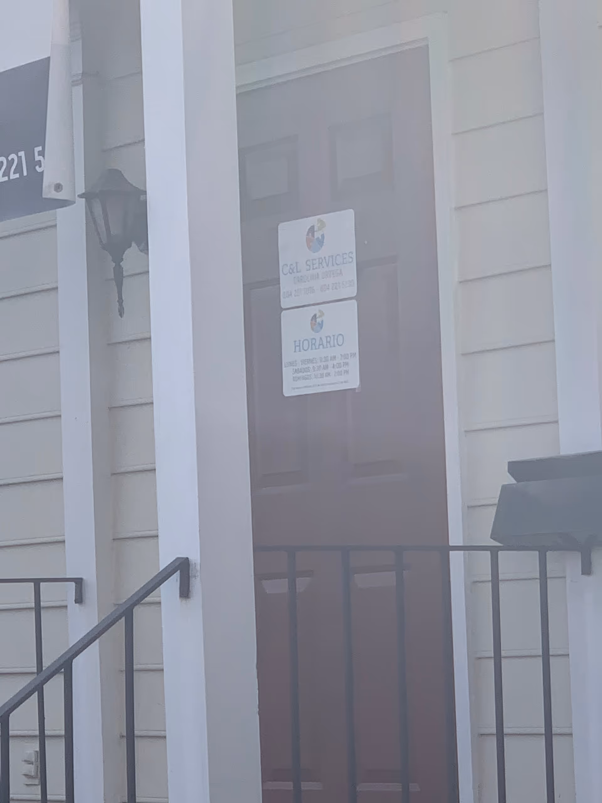 Exterior view of Hobby Home Care front entrance with a brown door.