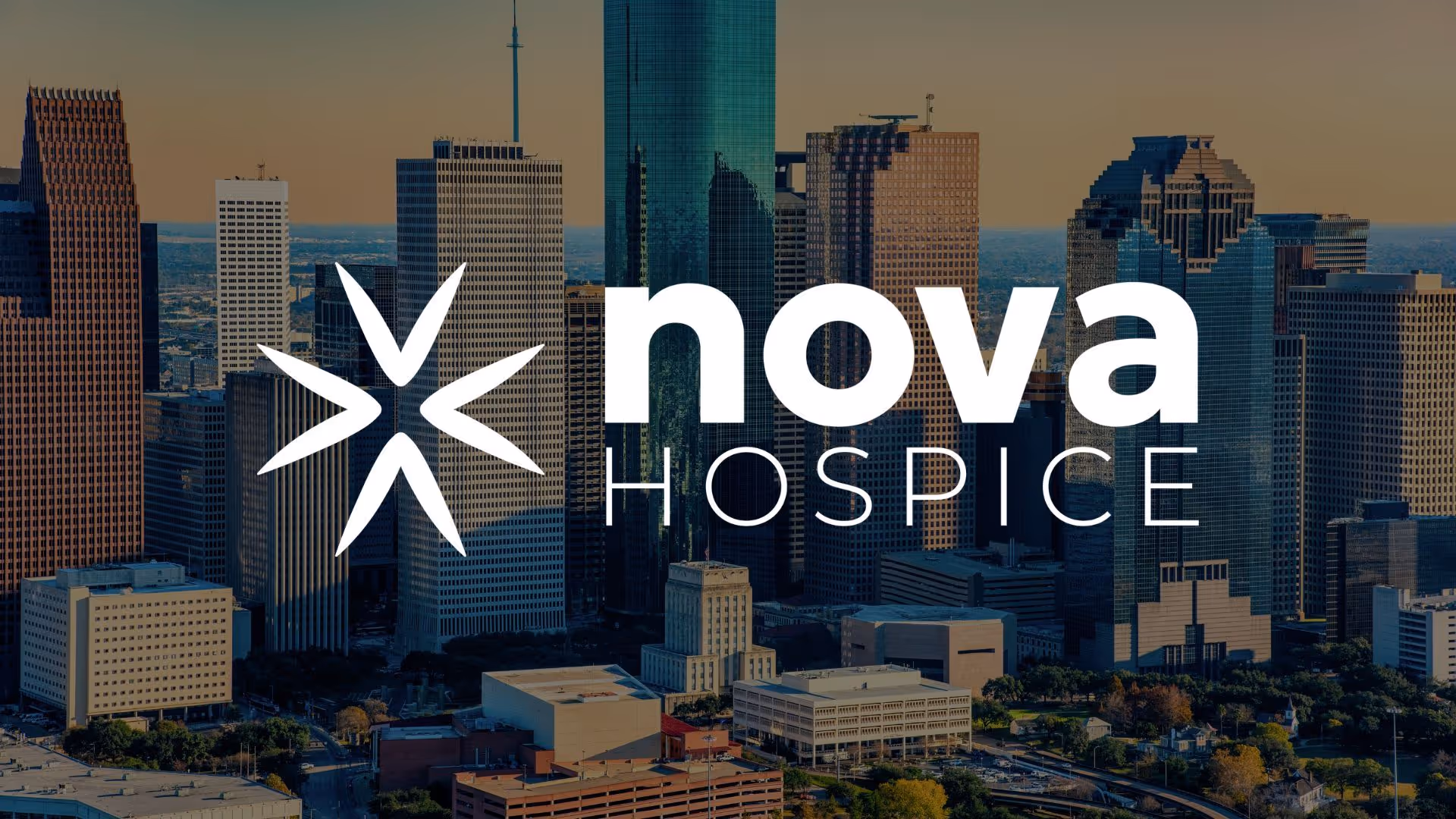 City skyline with tall buildings and a Nova Hospice logo overlay