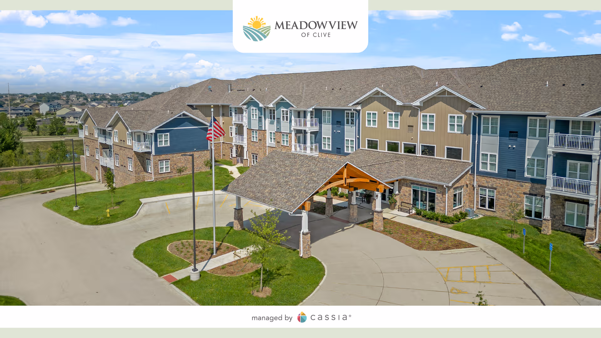 Aerial view of Meadowview of Clive exterior building with covered entrance and circular drive.