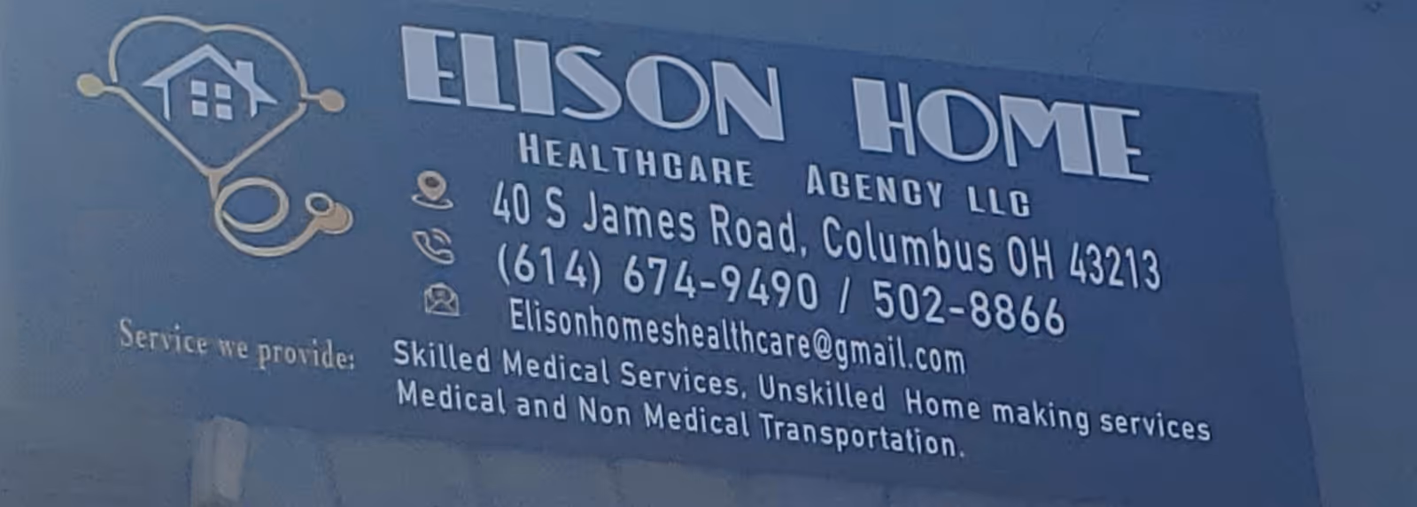 Blue sign for Elison Home Health Care Agency with address and phone numbers