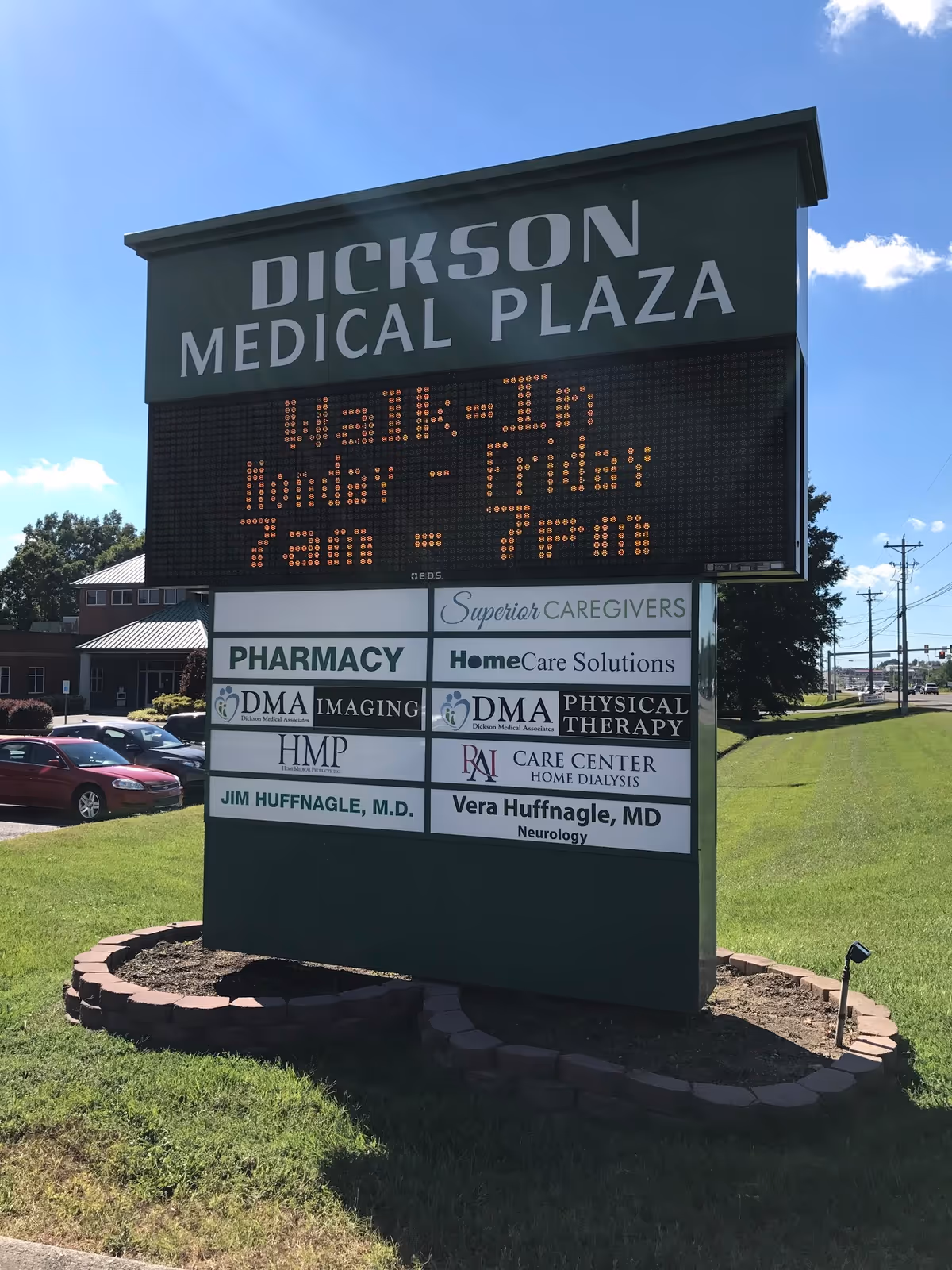 Outdoor sign for Dickson Medical Plaza featuring tenant signs and landscaping