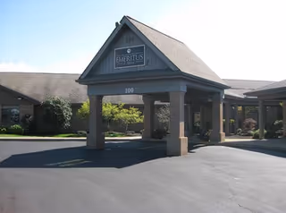 Exterior view of Brookdale Medina South entrance with a covered driveway.