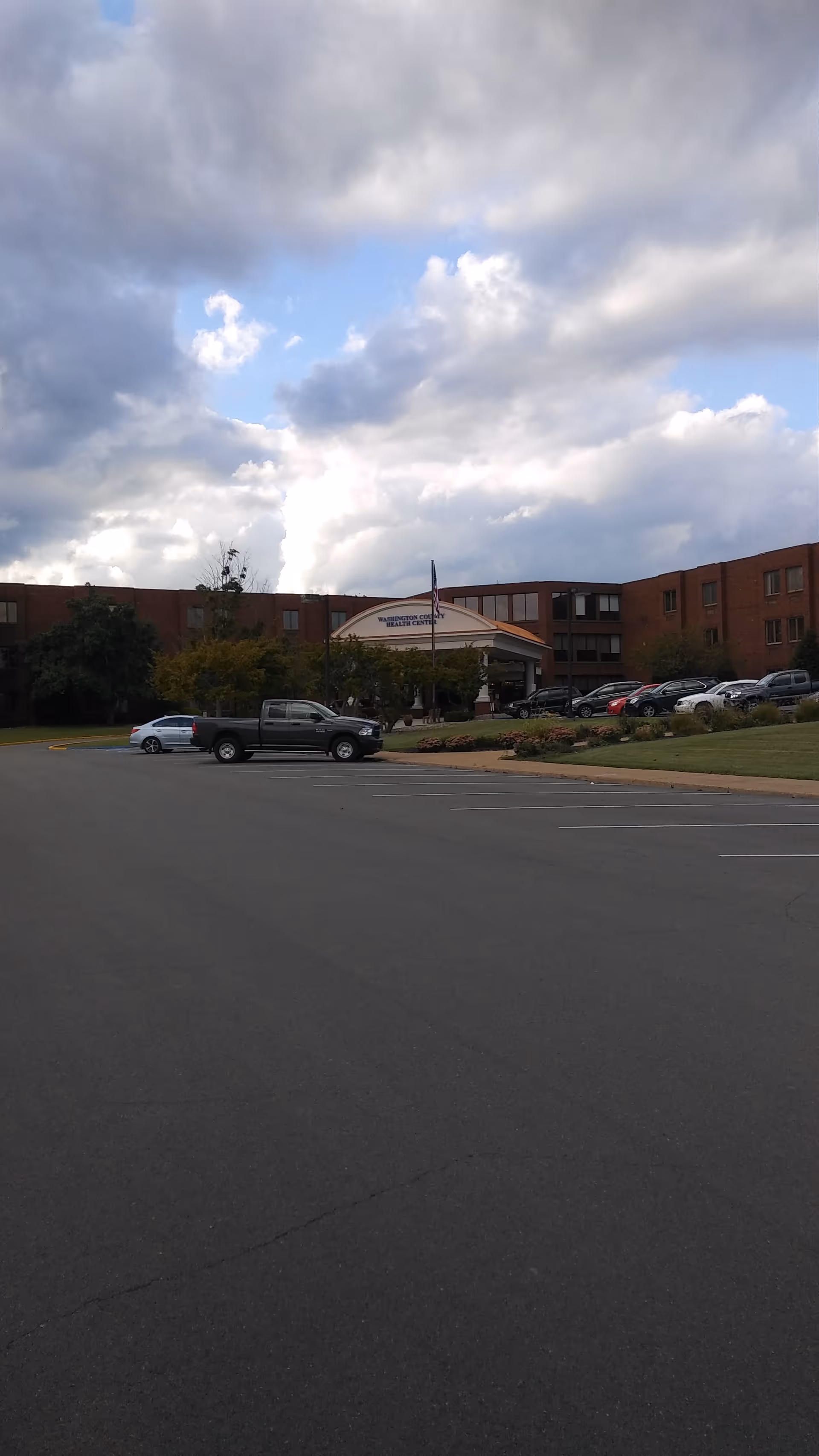 Exterior view of Washington Rehab and Nursing Center with parking and front entrance canopy.