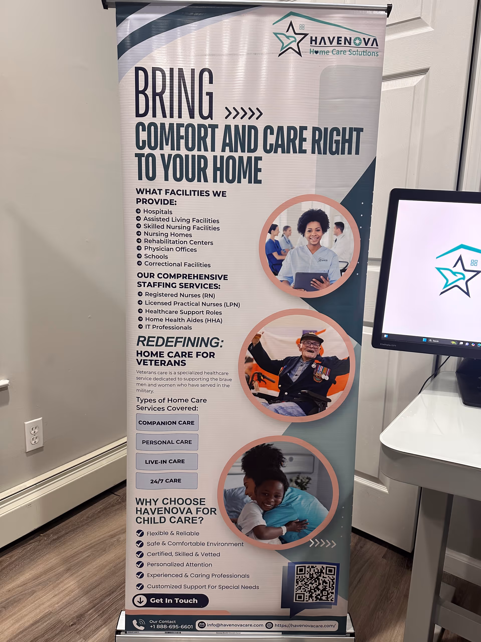 Indoor banner advertising Havenova Home Care Solutions beside a doorway and desk.
