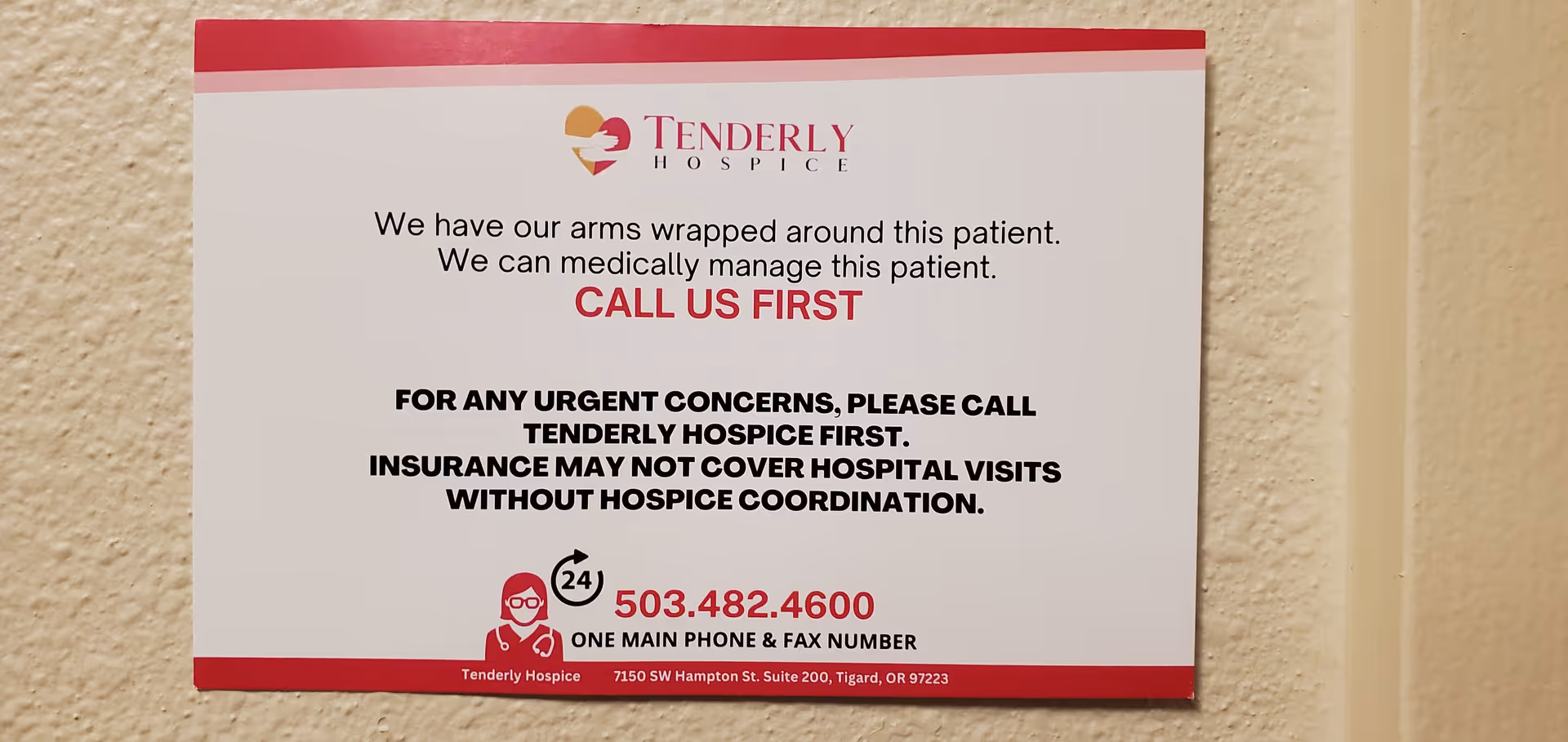 Sign on a beige interior wall displays Tenderly Hospice information and contact numbers.