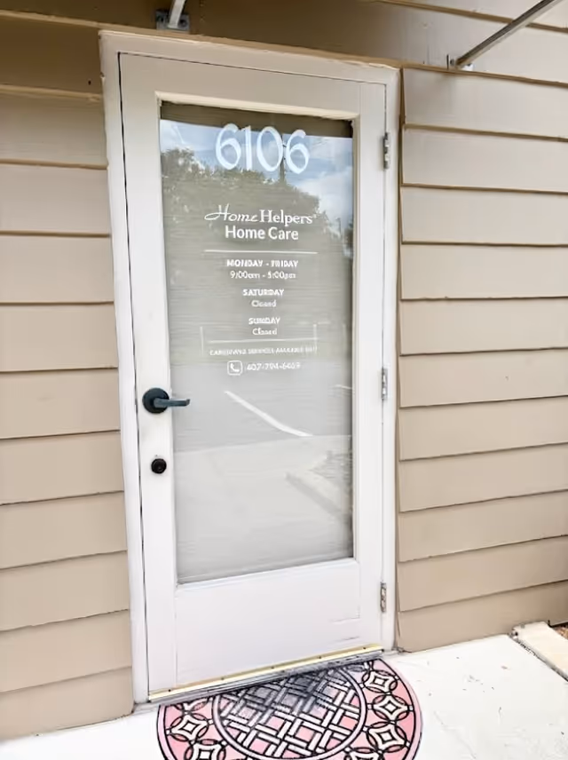 Exterior door with Home Helpers Home Care signage and address 6106.