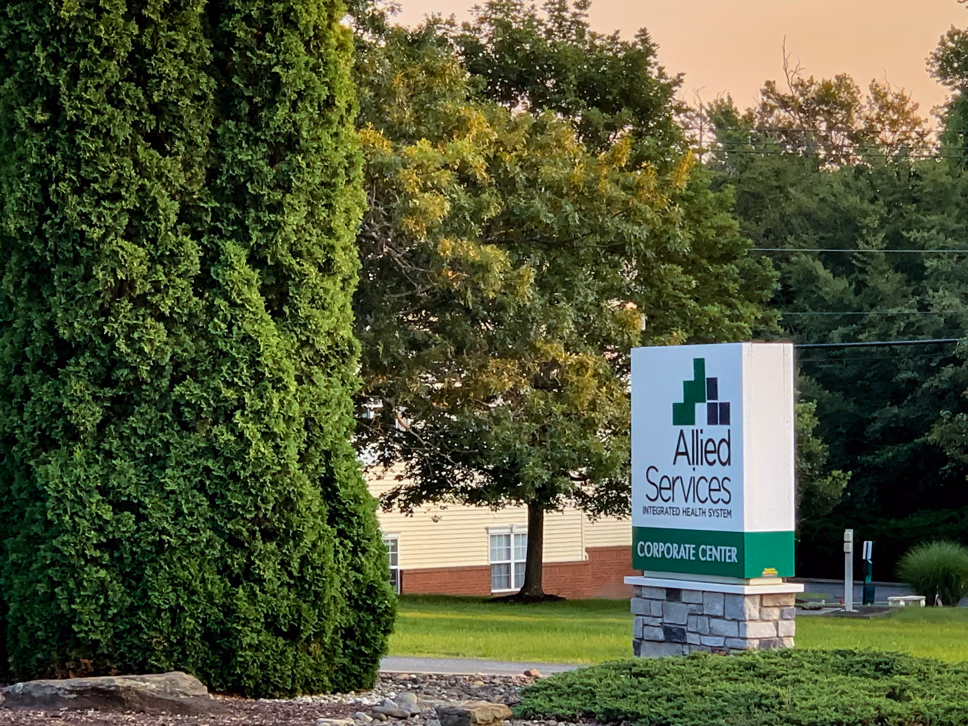Exterior view of Allied Services sign in front of a building.
