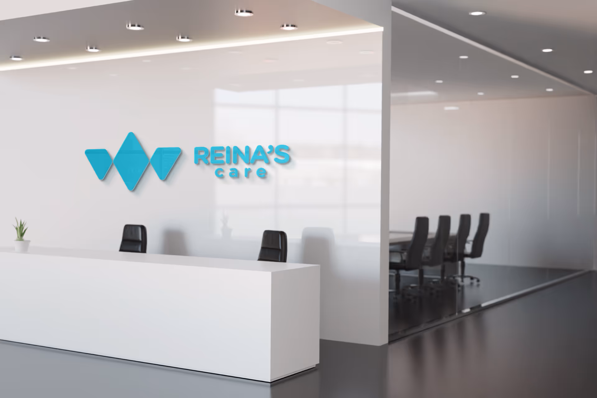 Modern reception area with white desk, glass partition, and Reina's care logo.
