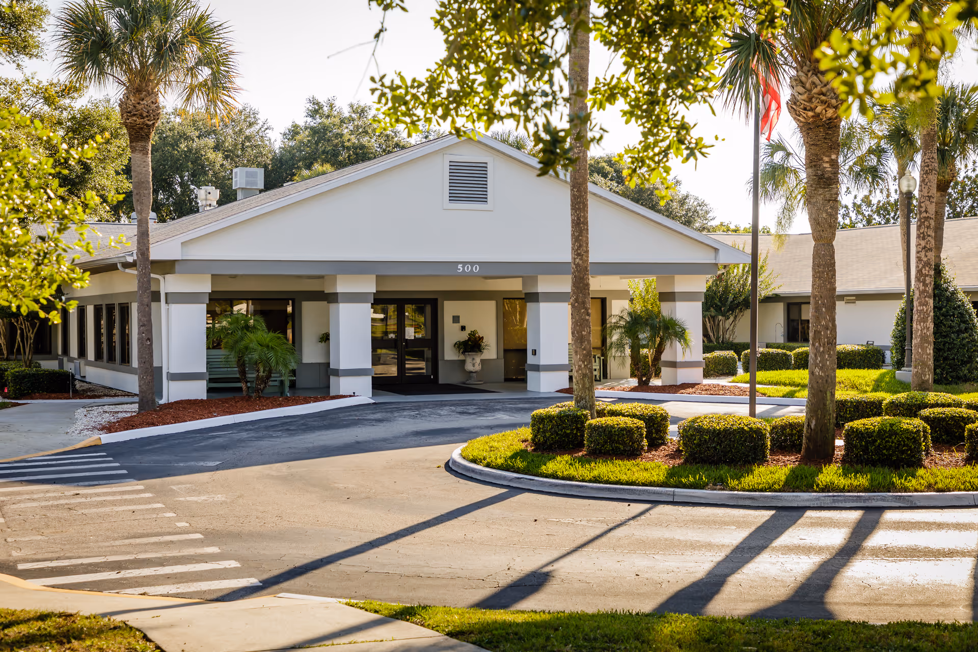 Exterior view of Solaris Healthcare Merritt Island, showing the entrance and landscaped grounds.