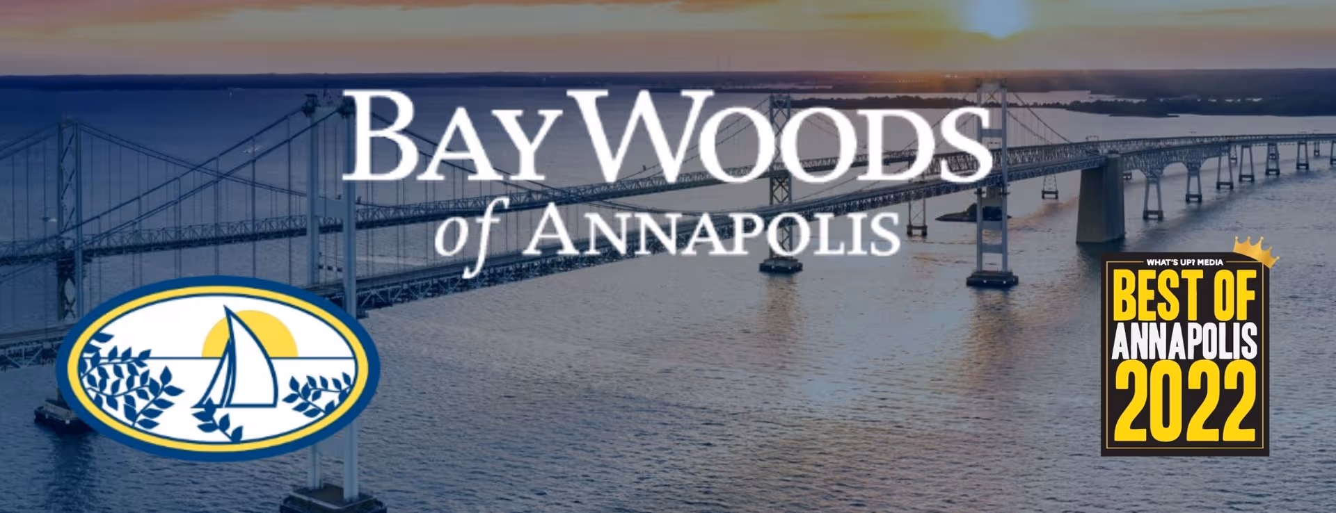 Brand banner for Bay Woods of Annapolis with a bridge over water at sunset.