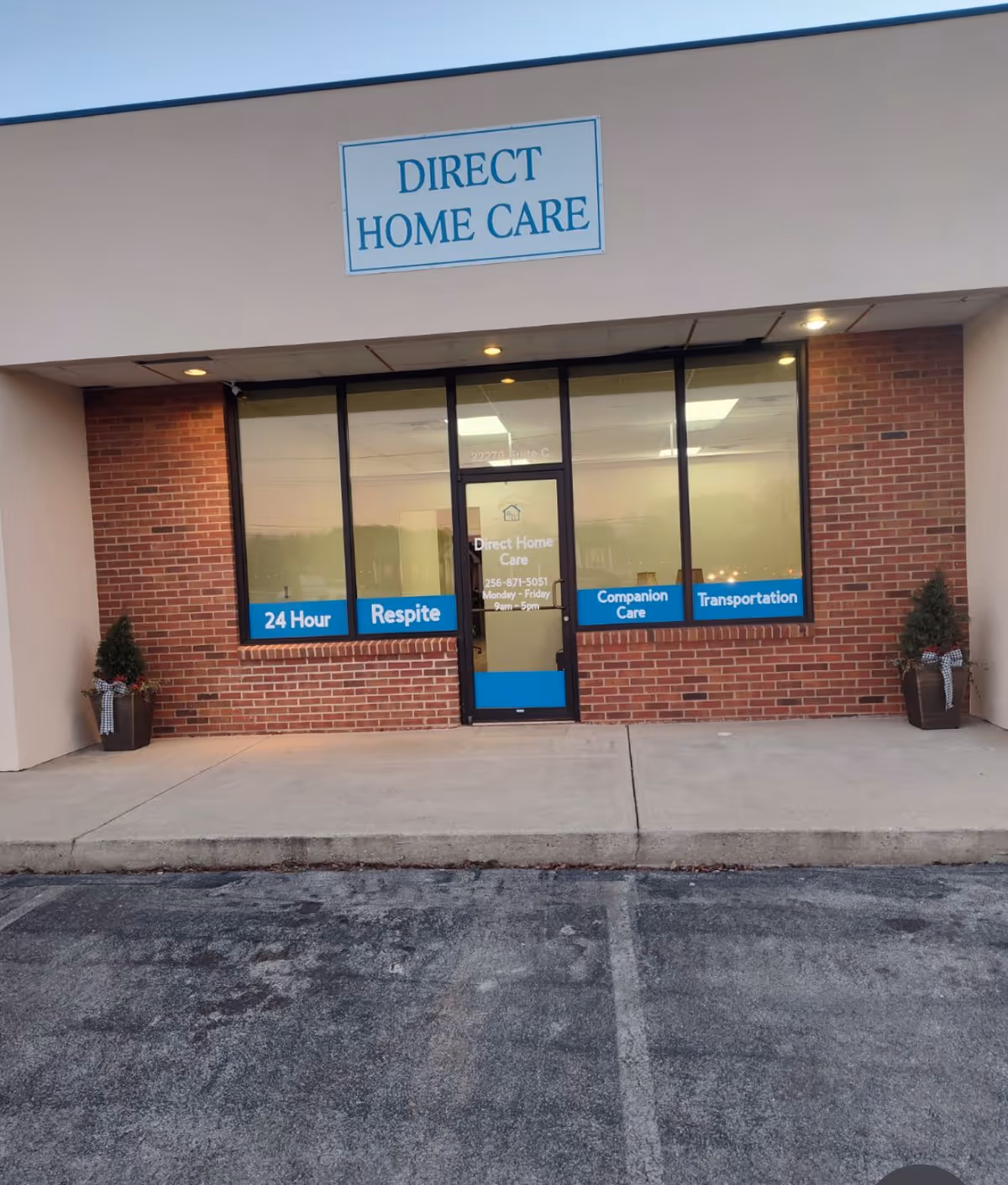 Exterior view of Direct Home Care storefront with brick facade and glass entrance.