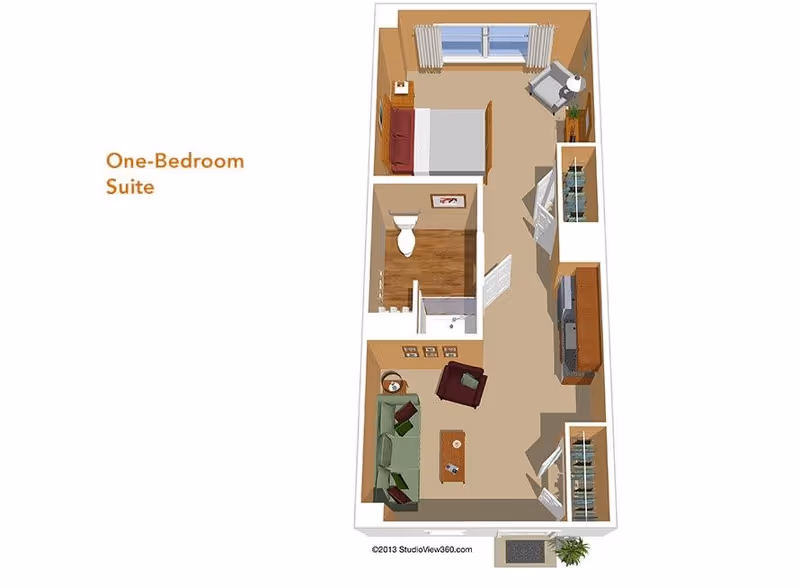 3D floor plan of a one-bedroom suite showing a bedroom with a bed and armchair, a bathroom with a toilet and shower, a living room with a sofa, armchair, coffee table, and TV, and closets near the entrance.