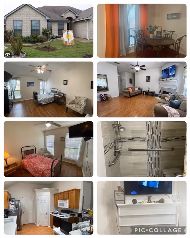 Collage of eight images showing various parts of the Anointed Affordable Senior Home of Hope facility. Top left image shows the exterior front view of a single-story brick building with a small garden and a welcome sign. Top right image shows a dining area with a round table, four chairs, and a window with orange curtains. Middle left and center left images show two different bedrooms, each with a bed, chair, and ceiling fan. Middle right image shows a living room with sofas, a coffee table, a TV mounted above a fireplace, and ceiling fans. Bottom left image shows a kitchen with wooden cabinets, a stove, microwave, and refrigerator. Bottom center image shows a bathroom shower with grab bars and tiled walls. Bottom right image shows a close-up of the fireplace mantel with decorations and a TV above it.