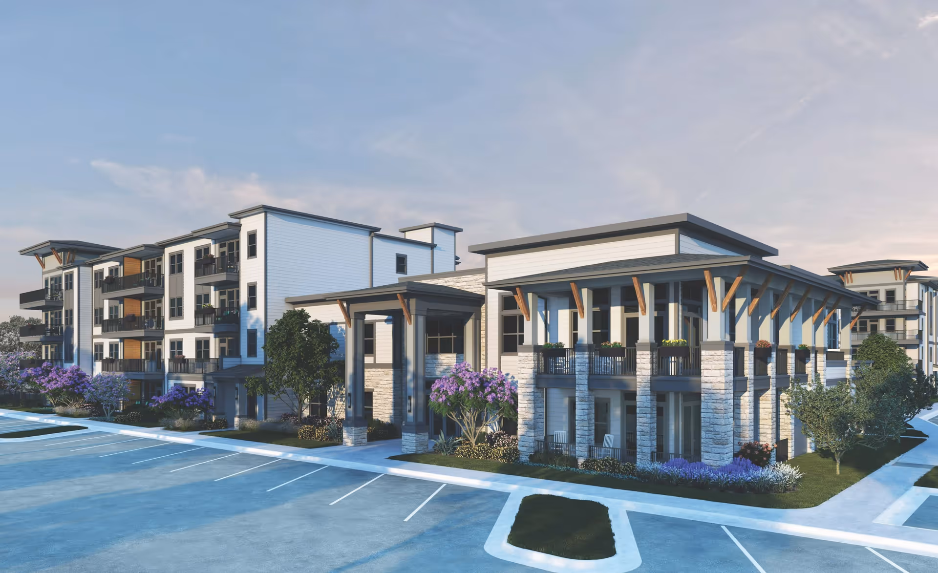 Exterior view of a modern multi-story senior living facility named Sage Plum Creek, featuring a combination of stone and wood architectural elements, balconies, landscaped greenery, and a large parking area in front under a partly cloudy sky.