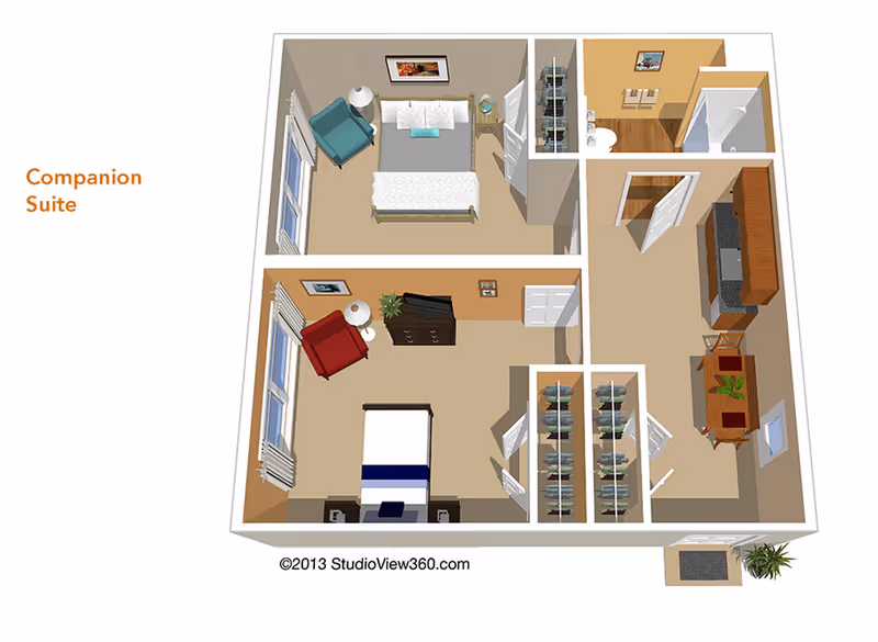 3D floor plan of a companion suite featuring two bedrooms, each with a bed, chair, and nightstand. The suite includes a shared bathroom with a shower and a kitchen area with cabinets, a stove, and a dining table with chairs. There are closets between the bedrooms and the kitchen area.