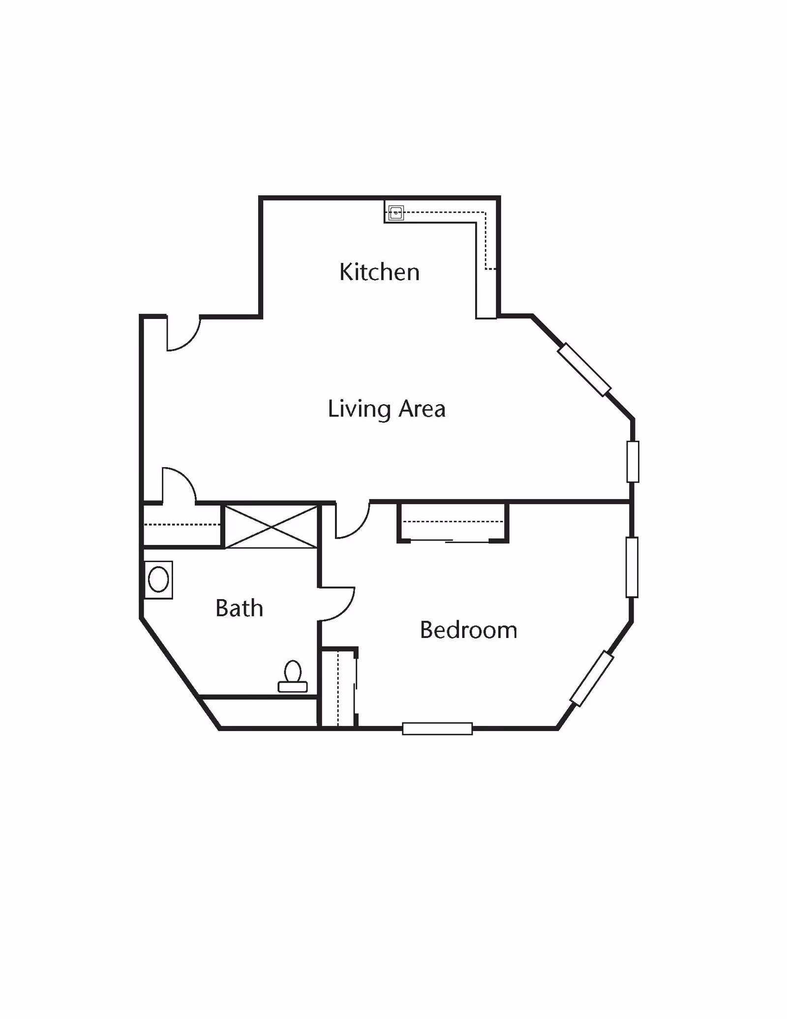 Architectural floor plan showing a layout with a kitchen, living area, bedroom, and bathroom.