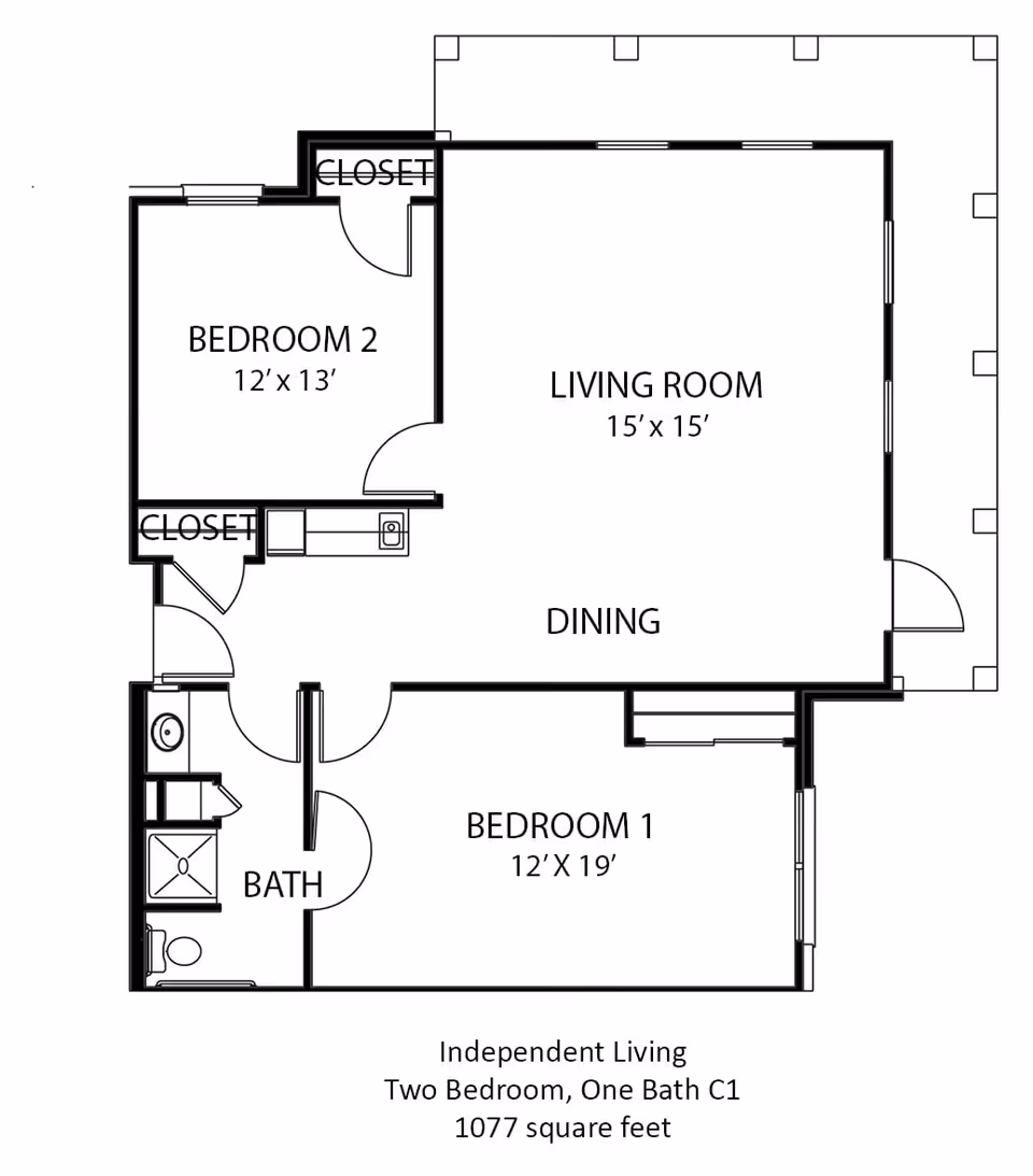 Floor plan of an independent living apartment with two bedrooms and one bathroom. Bedroom 1 measures 12 by 19 feet, Bedroom 2 measures 12 by 13 feet. There is a living room measuring 15 by 15 feet combined with a dining area. The bathroom includes a shower, toilet, and sink. The total area is 1077 square feet.
