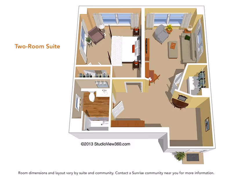 3D floor plan of a two-room suite showing a bedroom with a bed and armchair, a living room with a sofa, armchair, TV, and desk, a bathroom with a toilet, sink, and bathtub, and closets. The layout includes windows and doors with furniture placement.