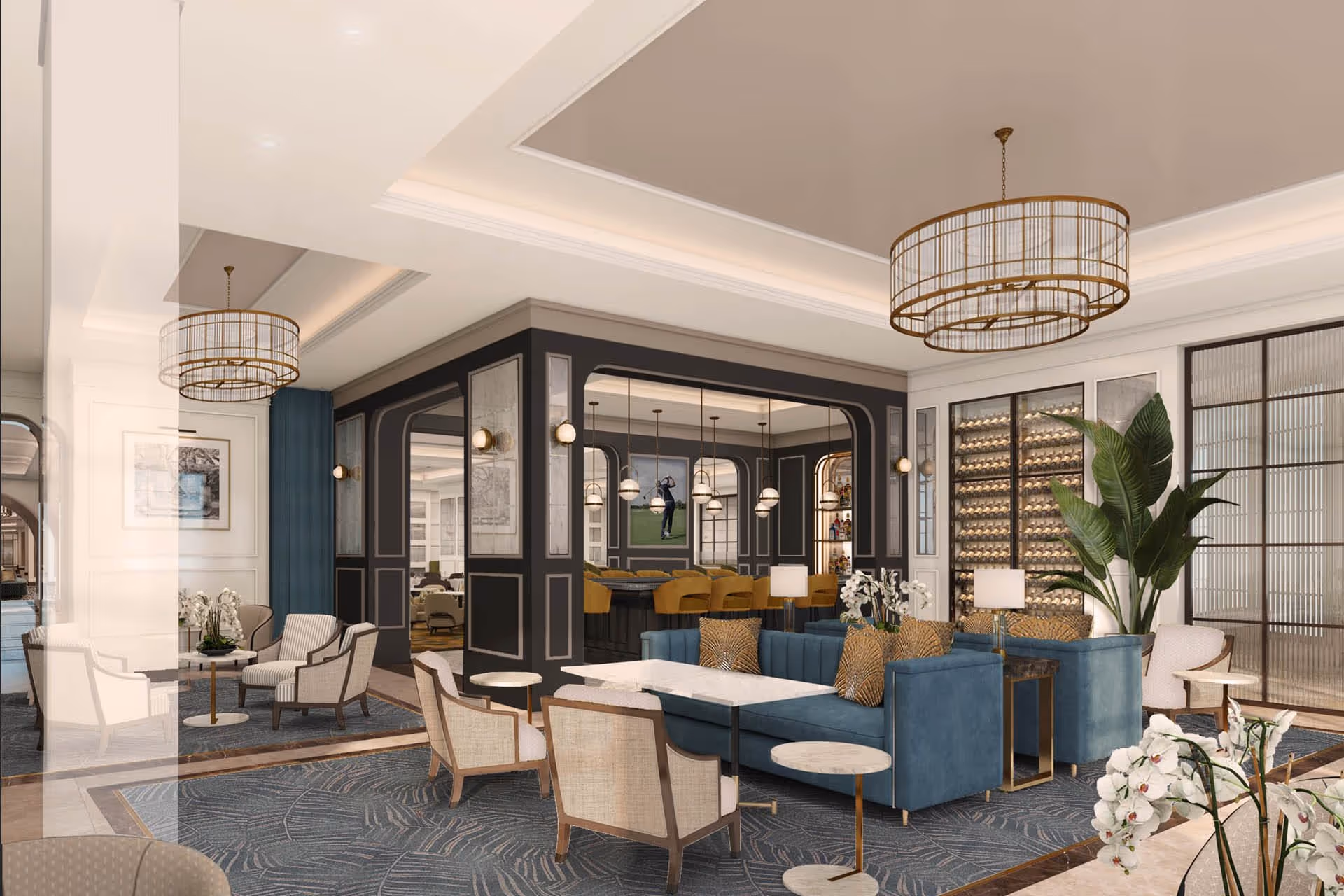 A modern and elegant living room area with blue sofas, beige armchairs, small round tables, and decorative pillows. The room features a large plant, white orchids, and a wine rack behind glass doors. There are two large circular chandeliers hanging from the ceiling and a bar area with yellow chairs and pendant lights in the background.