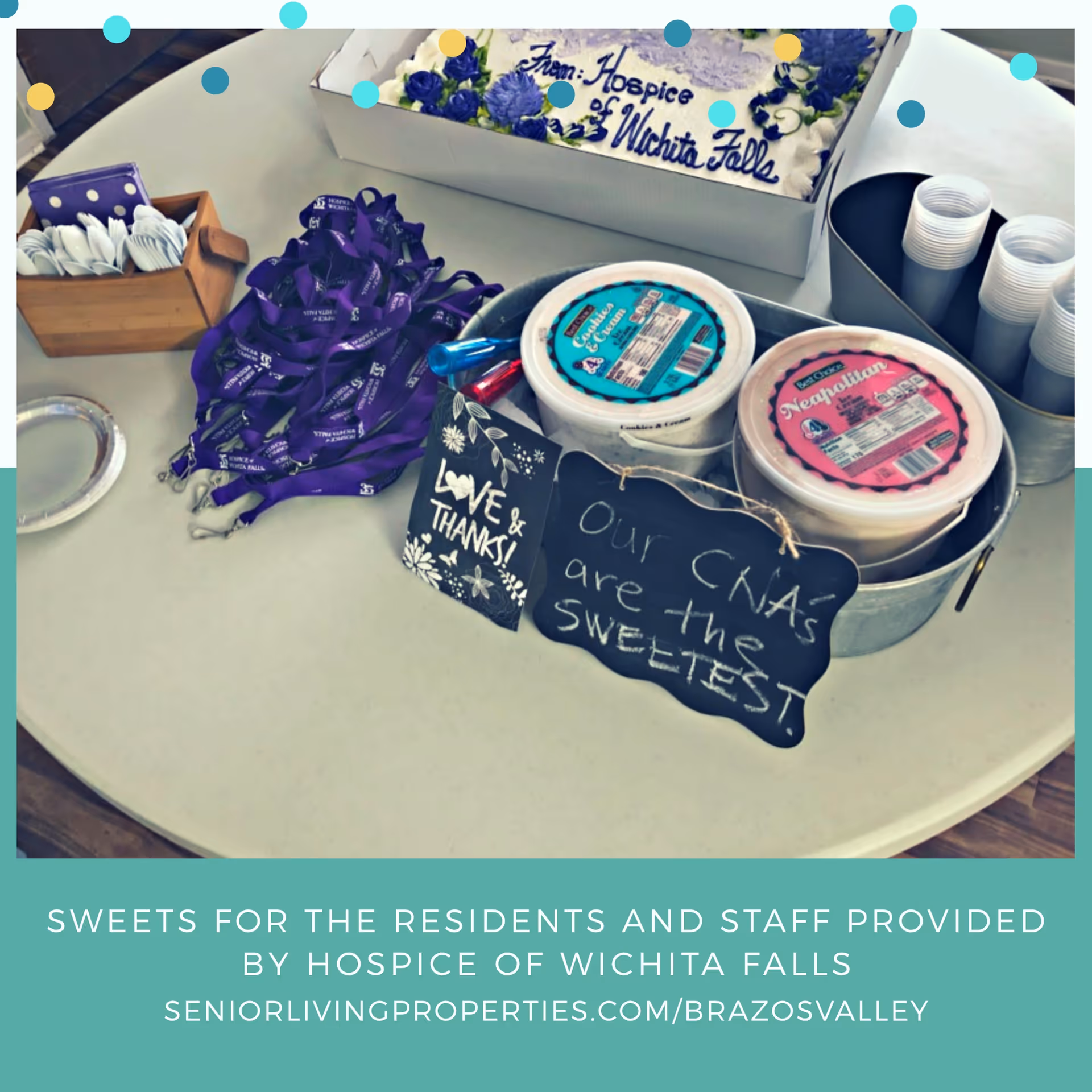 A table with containers of ice cream, plastic cups, a box of utensils, purple lanyards, and a cake in the background. There is a small chalkboard sign that reads 'Our CNAs are the sweetest' and a card that says 'Love & Thanks!'.