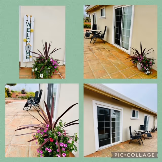 A collage of four images showing an outdoor patio area with terracotta tiles, beige exterior walls, sliding glass doors, black patio chairs, and potted plants with purple and white flowers. One image features a vertical wooden welcome sign with sunflowers and a small birdhouse attached.